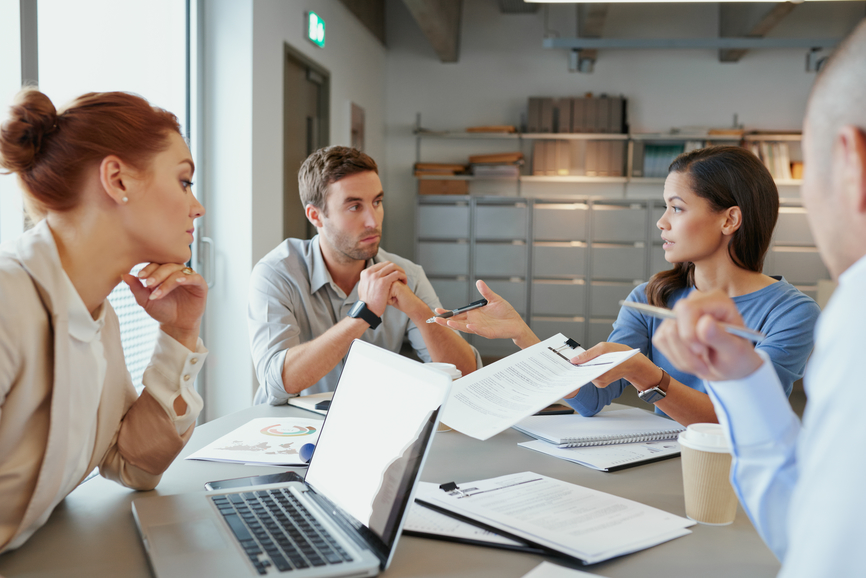 Business woman handing over legal document contract for signing in meeting