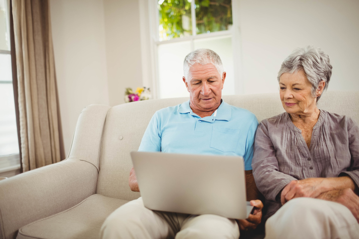 man and woman on sofa