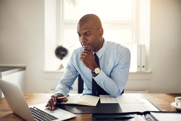 man working at laptop